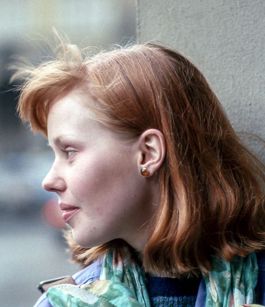 A portrait with an auburn bob