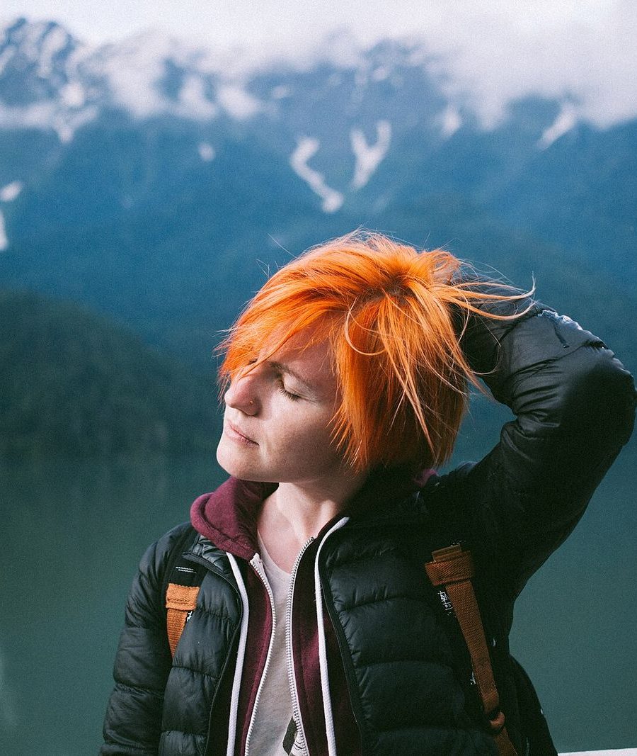 A portrait with a bright orange crop