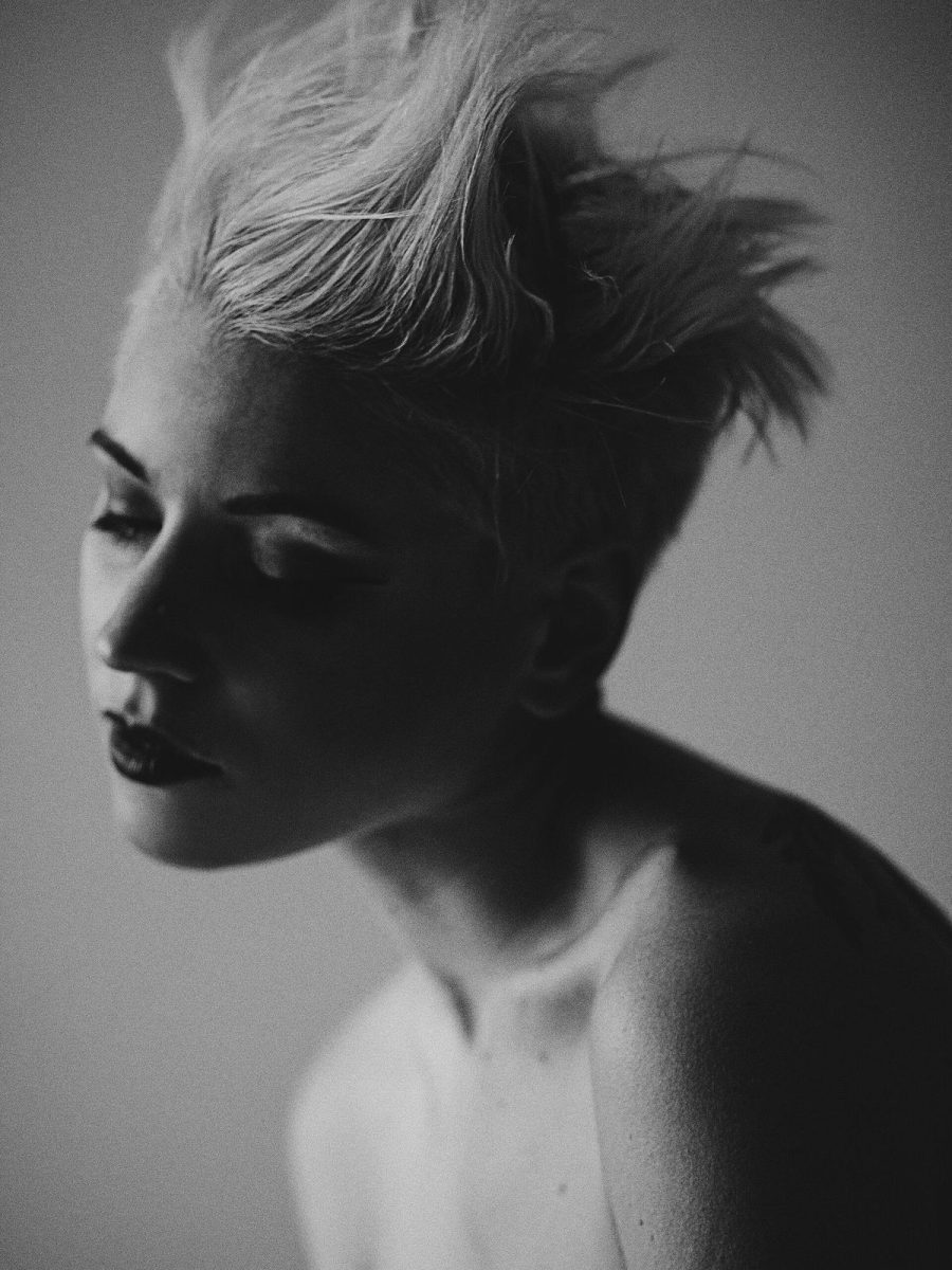 A portrait with a platinum pixie cut