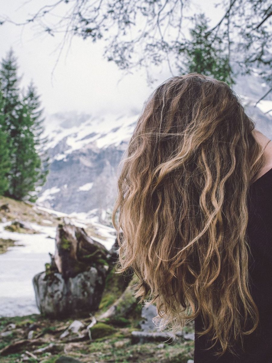 Long beachy waves seen from behind